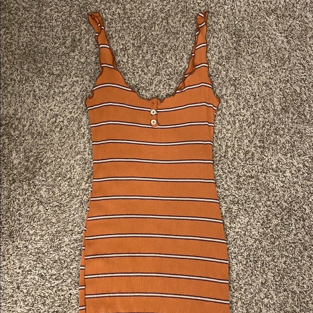 Tank dress with shoulder and bottom helm ruffle detail
